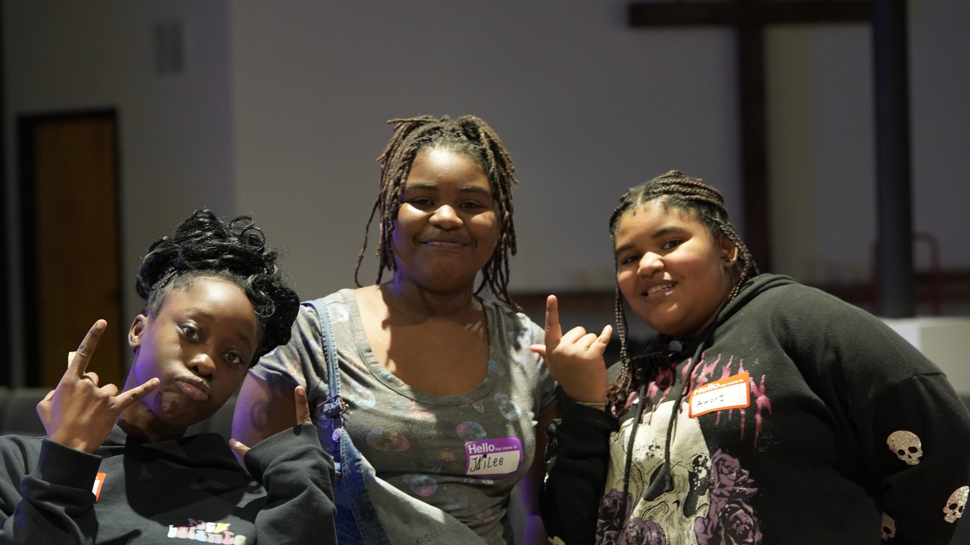 Teen girls posing together during an ECHO program night
